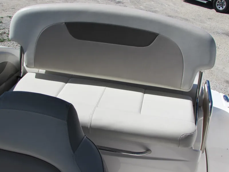 Slide: The Image of Chaparral Signature 2012 boat seating with white upholstery and stainless steel frame. - 11