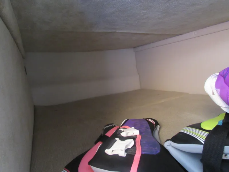 Slide: The Image of Interior cabin of 2012 Chaparral Signature boat with life jackets. - 17