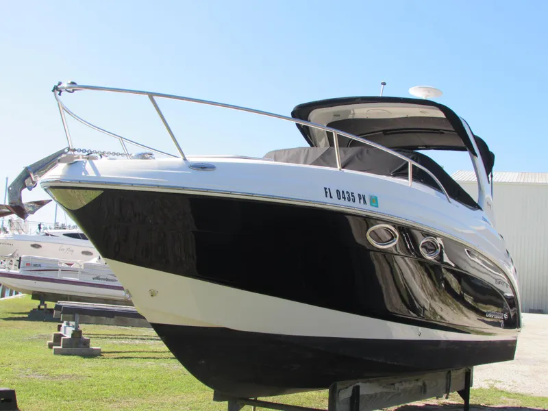 Slide: The Image of 2012 Chaparral Signature boat on dry dock, side view. - 2