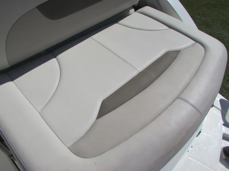 Slide: The Image of Chaparral Signature 2012 boat seat, white and gray upholstery, close-up view. - 6