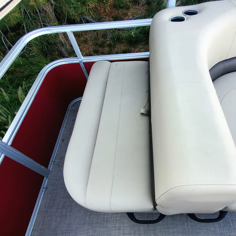Slide: The Image of 2023 Sun Tracker Party Barge 18 DLX pontoon boat seating area with cup holders. - 4