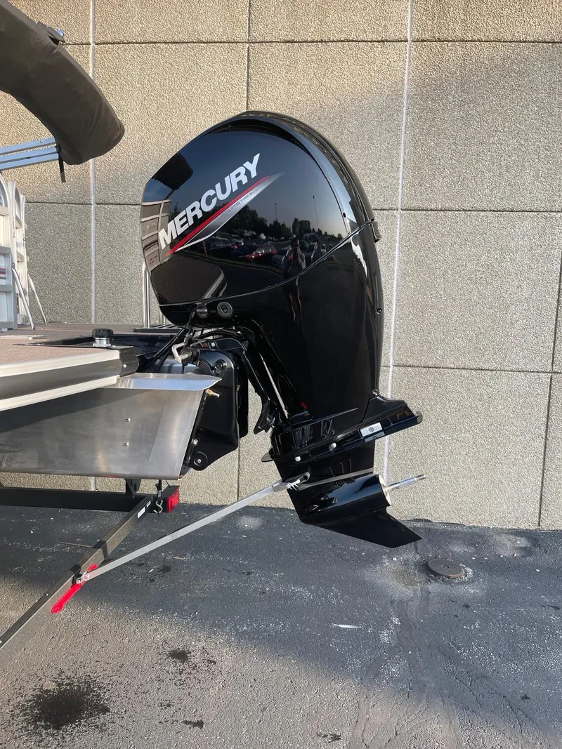 Slide: The Image of 2023 Ranger Reata 220C with Mercury outboard motor, side view. - 3