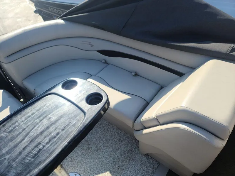 Slide: The Image of 2016 Bennington 20 SS boat interior with seating and table. - 10