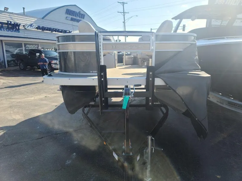 Slide: The Image of 2016 Bennington 20 SS pontoon boat on a trailer at a dealership. - 4