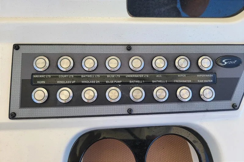 Slide: The Image of Control panel of a 2020 Scout 255 LXF boat with labeled buttons. - 20