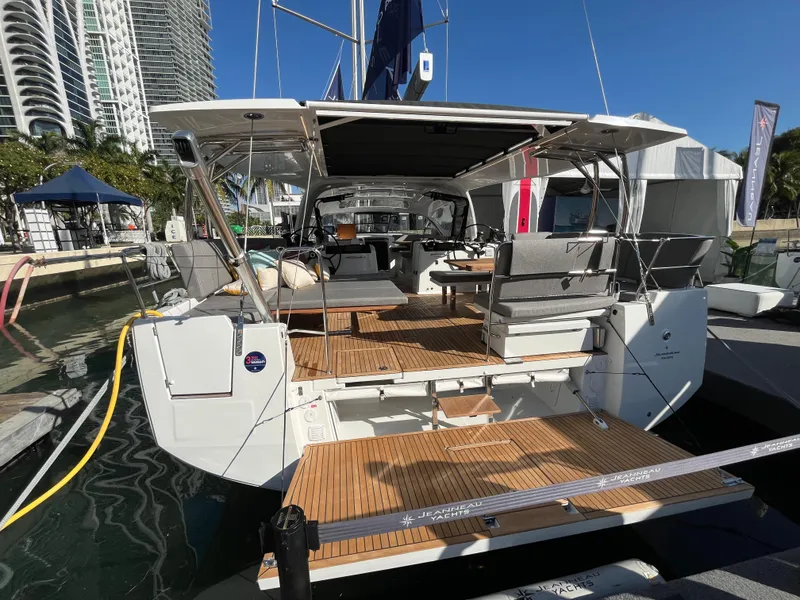 Slide: The Image of 2024 Jeanneau 55 yacht with spacious deck and modern design. - 7