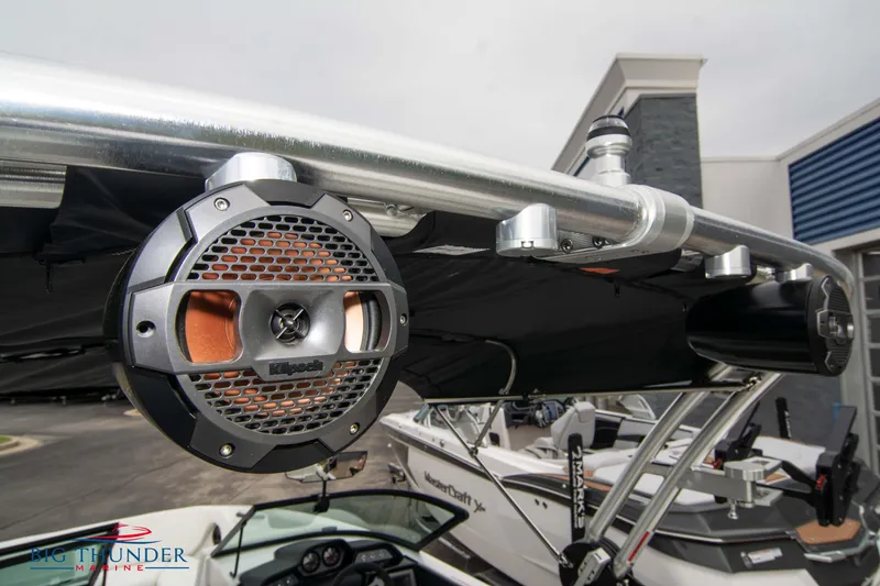Slide: The Image of 2023 MasterCraft NXT22 boat with mounted Kicker marine speakers. - 44