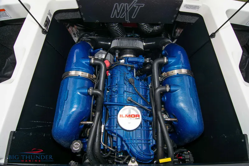 Slide: The Image of 2023 MasterCraft NXT22 boat engine compartment with Ilmor engine. - 48