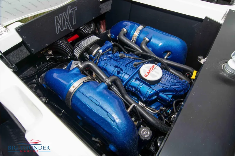 Slide: The Image of 2023 MasterCraft NXT22 engine compartment with Ilmor engine. - 49