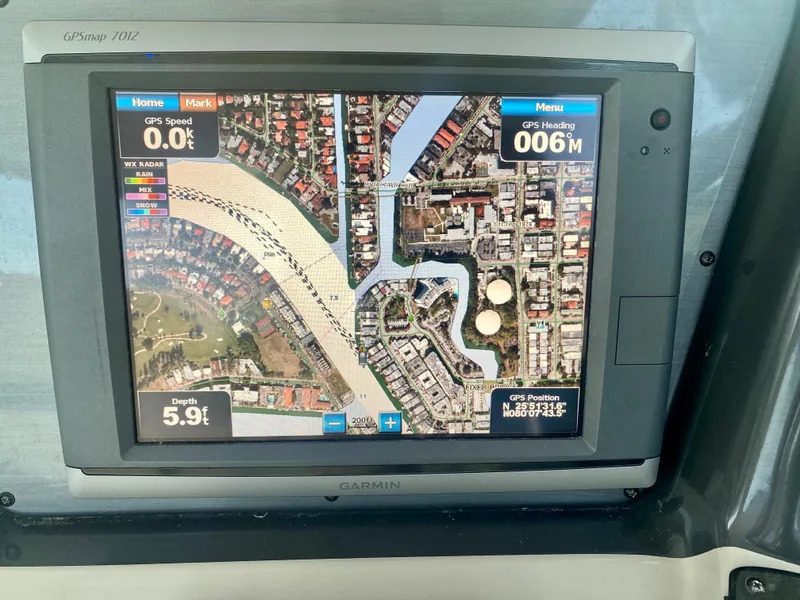 Slide: The Image of Garmin GPS display on a 2005 Sea Ray 420 Sundancer showing navigation map. - 16