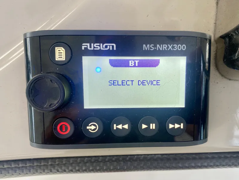 Slide: The Image of Fusion MS-NRX300 control panel on a 2005 Sea Ray 420 Sundancer boat. - 18