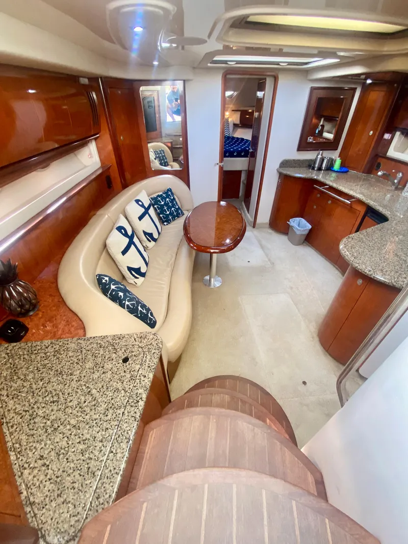 Slide: The Image of Luxurious interior of a 2005 Sea Ray 420 Sundancer yacht with modern amenities. - 35