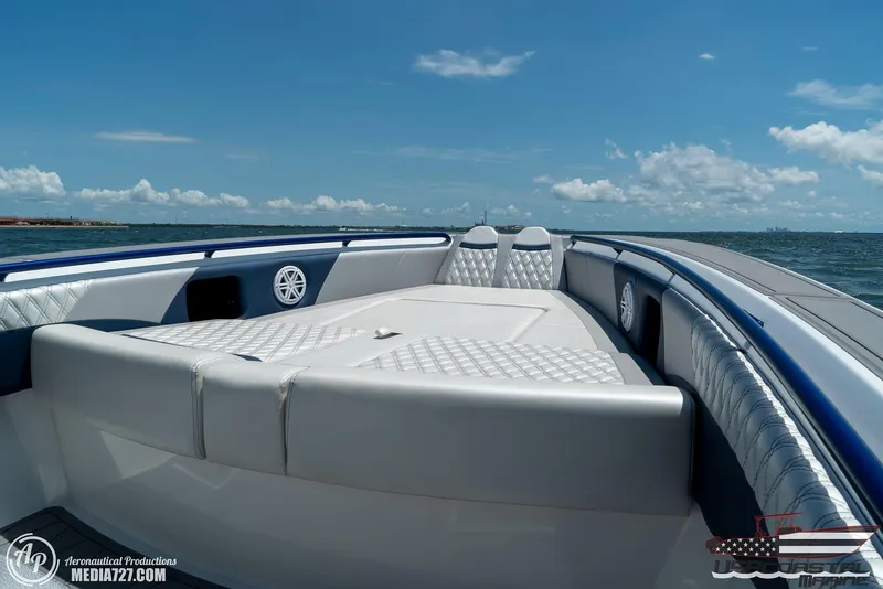 Slide: The Image of 2018 Statement 38 Open boat with luxurious seating on open water. - 24