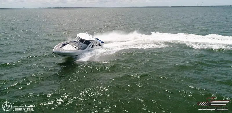 Slide: The Image of 2018 Statement 38 Open boat speeding on open water. - 27