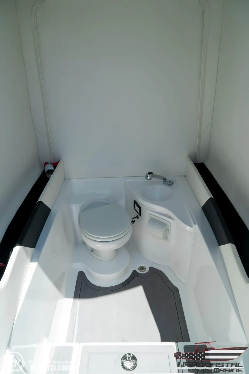 Slide: The Image of 2018 Statement 38 Open boat interior with modern toilet and sleek design. - 42