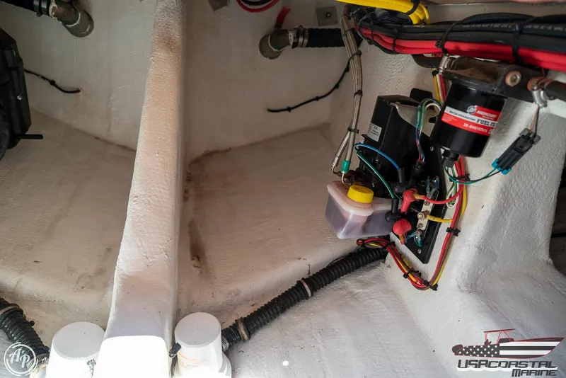 Slide: The Image of Engine compartment of 2018 Statement 38 Open boat with wiring and components. - 46