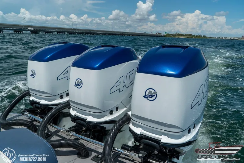 Slide: The Image of Triple Mercury 400R outboard engines on a 2018 Statement 38 Open boat. - 5