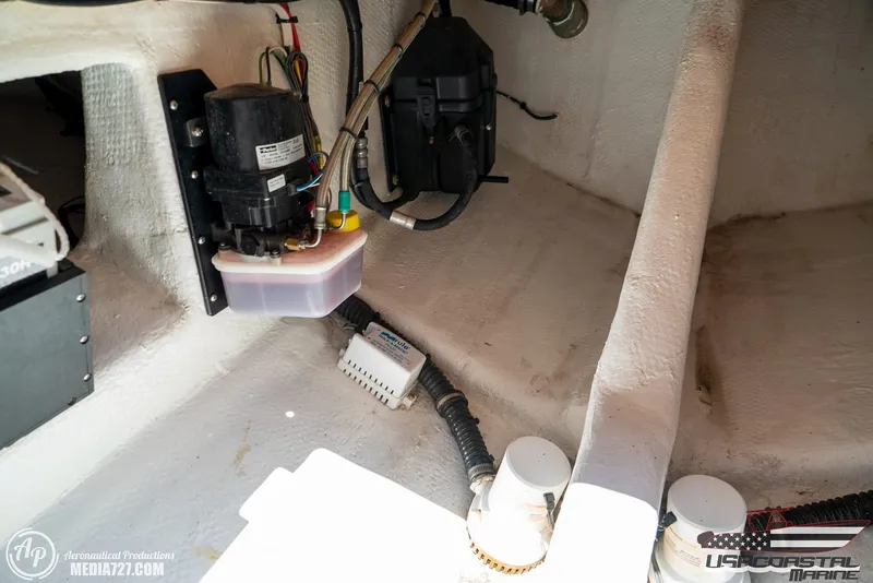 Slide: The Image of Interior view of 2018 Statement 38 Open boat showing electrical components and wiring. - 8