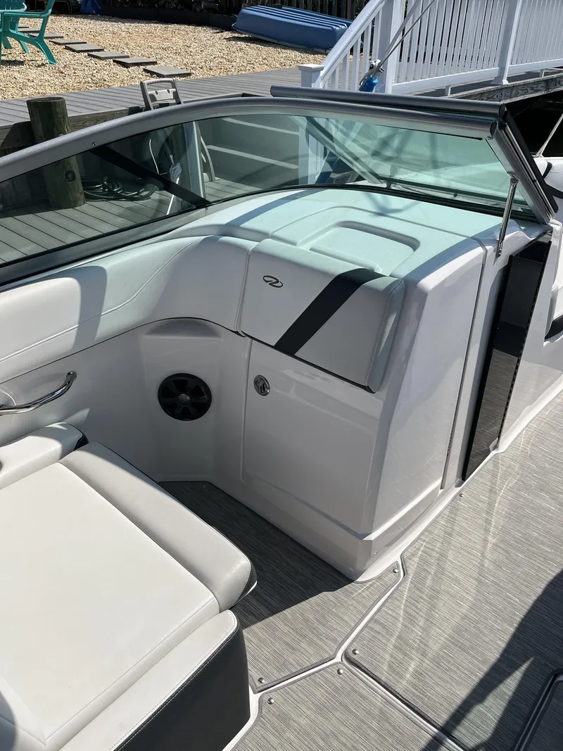 Slide: The Image of 2017 Regal 23 OBX boat interior with sleek seating and modern design. - 5