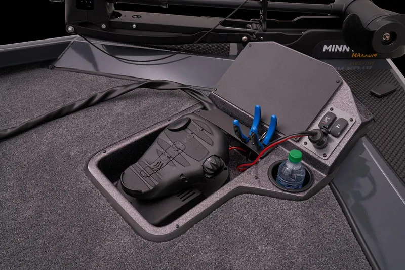 Slide: The Image of 2023 Ranger RT188P boat control panel with foot pedal, cup holder, and tools. - 10