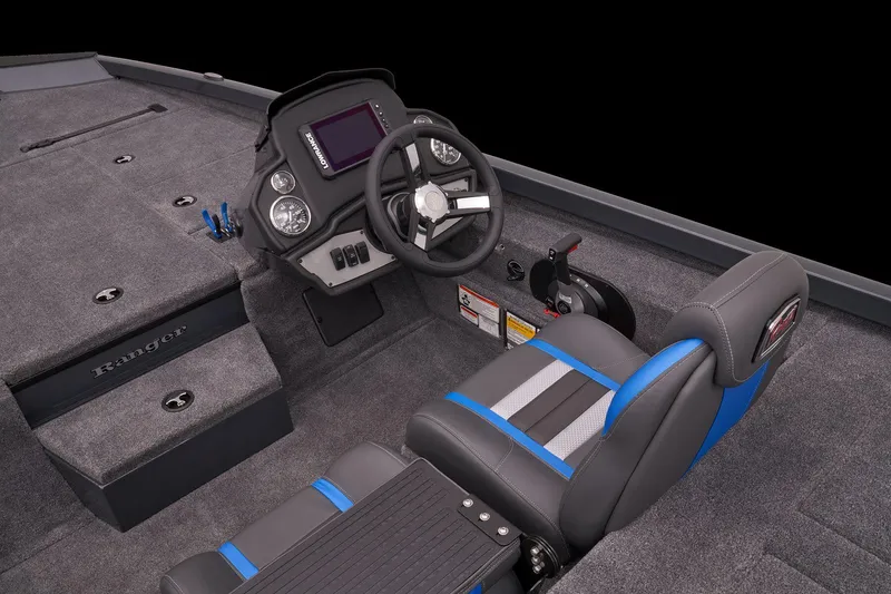Slide: The Image of 2023 Ranger RT188P boat interior with steering console and seating. - 12