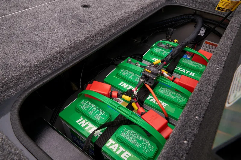 Slide: The Image of 2023 Ranger RT188P boat battery compartment with Interstate batteries. - 23