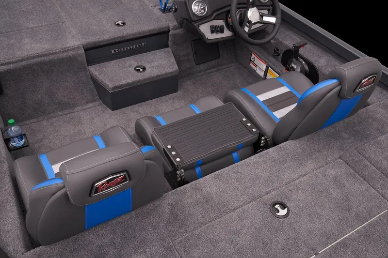 Slide: The Image of 2023 Ranger RT188P boat interior with gray and blue seating. - 28