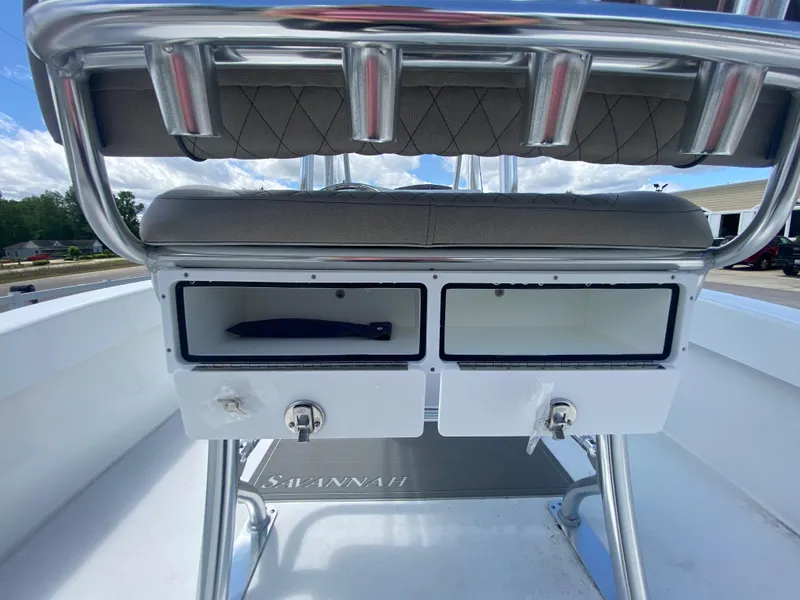Slide: The Image of 2024 Savannah SS21 boat storage compartments and seating. - 21