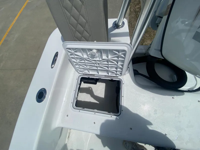 Slide: The Image of Open storage compartment on a 2024 Savannah SS21 boat. - 9