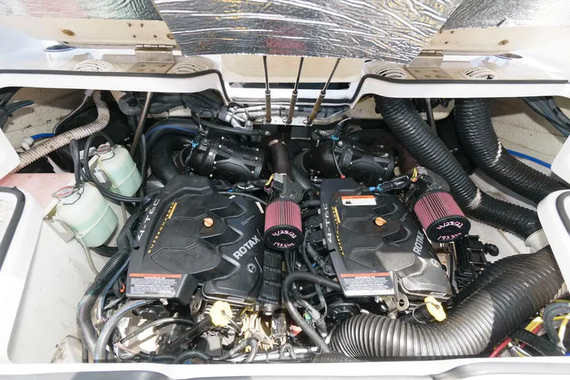 Slide: The Image of 2017 Scarab 255 HO Impulse engine compartment with dual Rotax engines. - 14