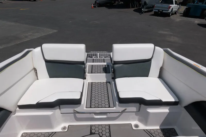 Slide: The Image of 2017 Scarab 255 HO Impulse boat interior with white and gray seating. - 4