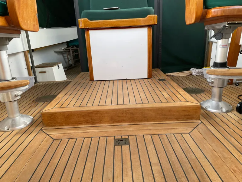 Slide: The Image of 1996 Downeast 36 Lobster Boat interior with wooden flooring and seating. - 12