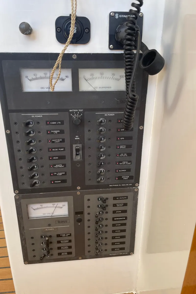 Slide: The Image of Control panel of a 1996 Downeast 36 Lobster Boat with gauges and switches. - 22