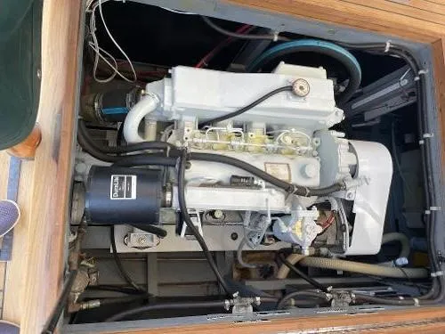 Slide: The Image of Engine compartment of a 1996 Downeast 36 Lobster Boat, showcasing mechanical components. - 37