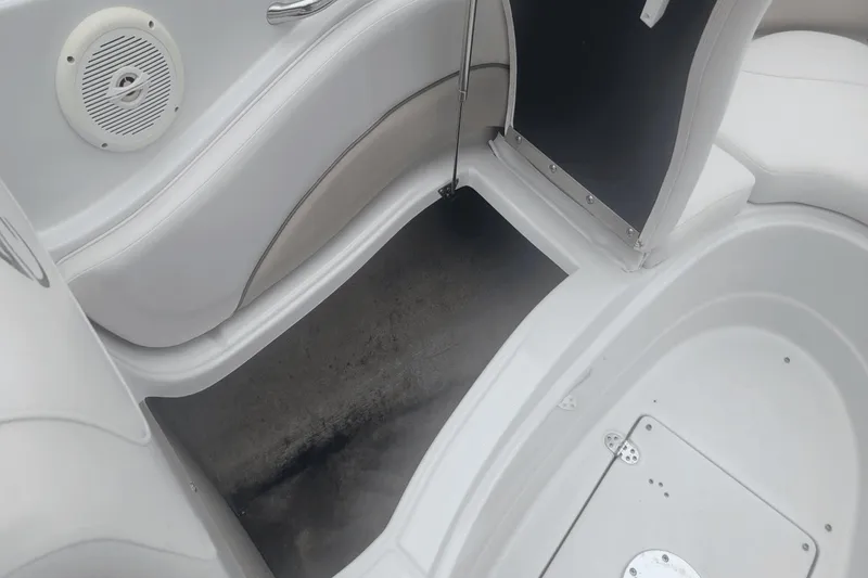Slide: The Image of Interior storage compartment of a 2012 Crownline 265 SS boat. - 16