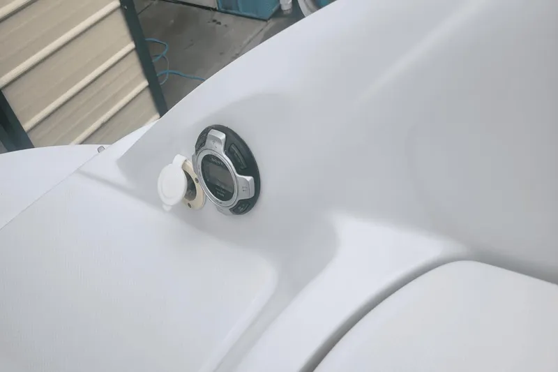 Slide: The Image of Close-up of the dashboard on a 2012 Crownline 265 SS boat. - 24