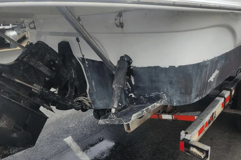 Slide: The Image of Close-up of the propeller and stern drive of a 2012 Crownline 265 SS boat. - 29