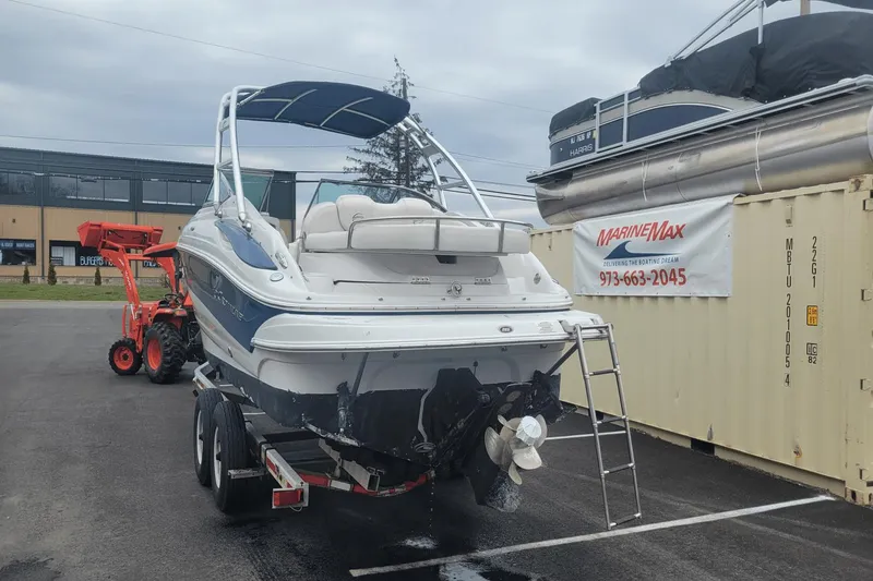 Slide: The Image of 2012 Crownline 265 SS boat on trailer at MarineMax dealership. - 3