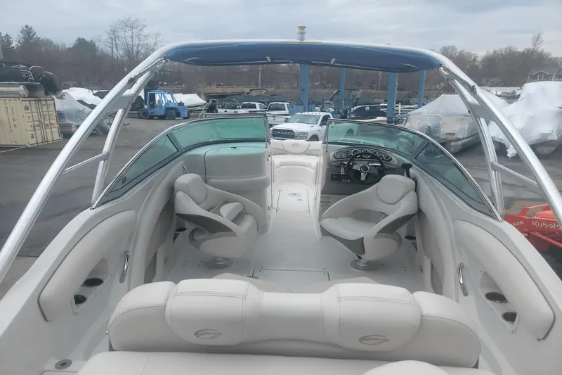 Slide: The Image of 2012 Crownline 265 SS boat interior with seating and steering wheel. - 4