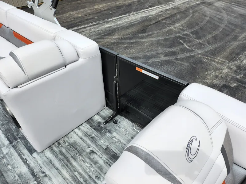 Slide: The Image of 2019 Crest Caliber 230 SL boat interior with white and gray seating. - 12