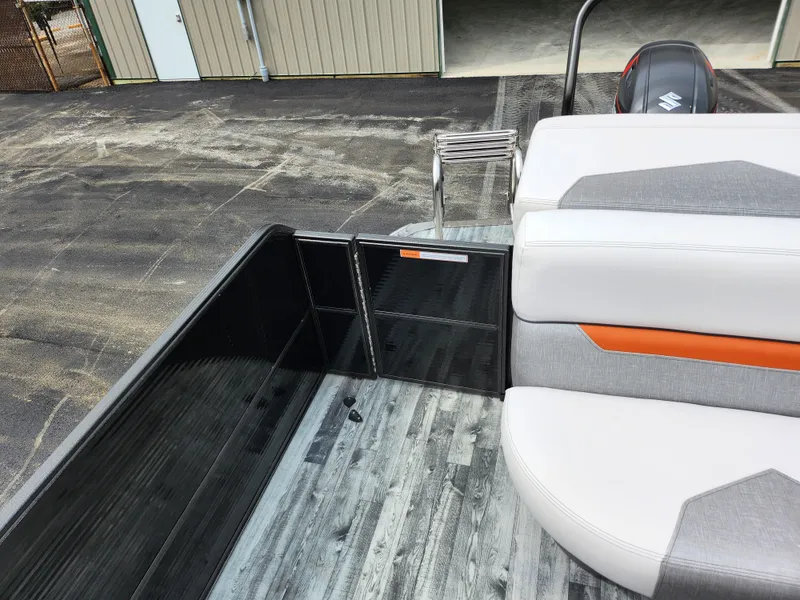 Slide: The Image of 2019 Crest Caliber 230 SL boat interior with seating and deck view. - 15