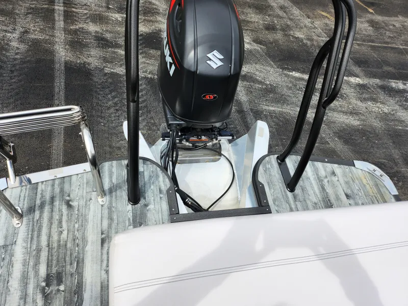 Slide: The Image of 2019 Crest Caliber 230 SL boat with Suzuki outboard motor. - 18