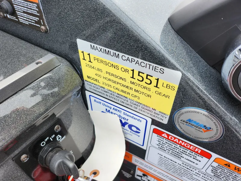 Slide: The Image of 2019 Crest Caliber 230 SL boat capacity label, 11 persons or 1551 lbs, 400 horsepower motor. - 22