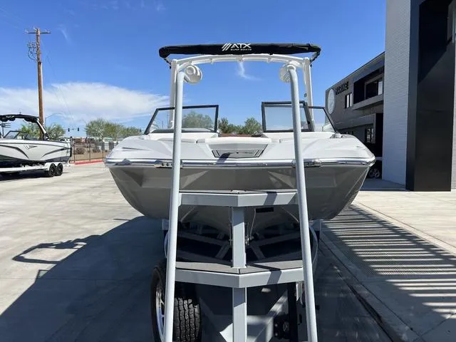 Slide: The Image of 2023 ATX Boats 22 TYPE-S on trailer, parked outdoors under clear sky. - 4