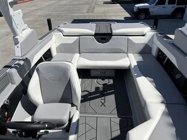 Slide: The Image of 2023 ATX Boats 22 TYPE-S interior with white seating and modern design. - 9