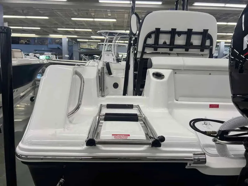 Slide: The Image of 2023 Tidewater 210 Adventure boat interior with ladder and seating. - 3