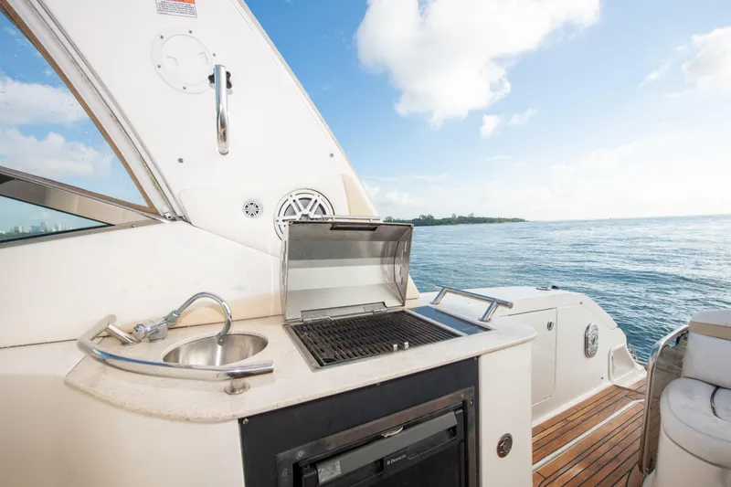 Slide: The Image of 2009 Sea Ray 350 Sundancer yacht with outdoor kitchen and ocean view. - 29