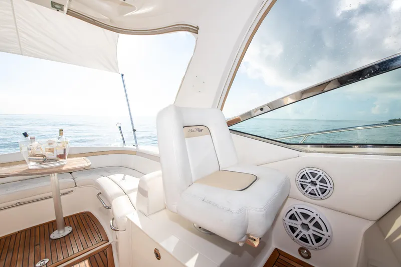Slide: The Image of 2009 Sea Ray 350 Sundancer interior with ocean view and seating. - 30