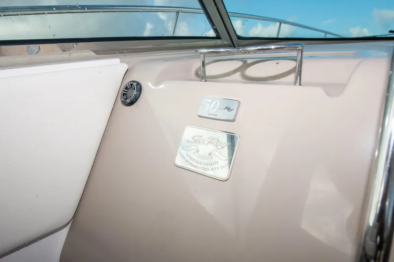 Slide: The Image of 2009 Sea Ray 350 Sundancer boat interior detail with logo and emblem. - 36