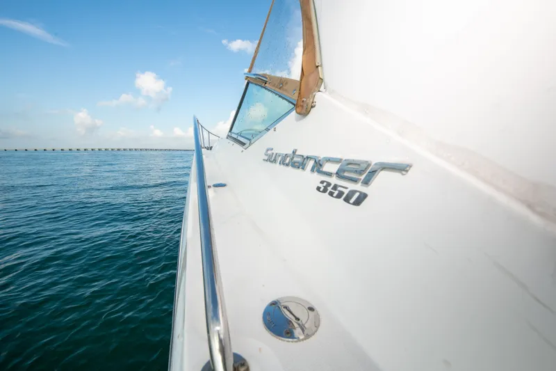 Slide: The Image of 2009 Sea Ray 350 Sundancer yacht on open water. - 37